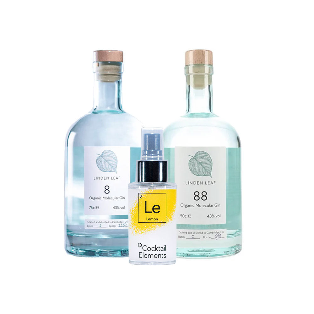 Two Linden Leaf Organic Molecular Gin bottles with cork stoppers, one labeled '8' and one labeled '88', with lemon Cocktail Elements spray bottle positioned between them on white background