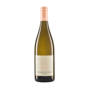 Bottle of Birgit Braunstein Chardonnay Leithaberg DAC Burgenland white wine. The bottle is clear glass, showing the pale yellow wine, and has a light peach-colored screw cap. The label is light cream with peach-colored text and a stylized 